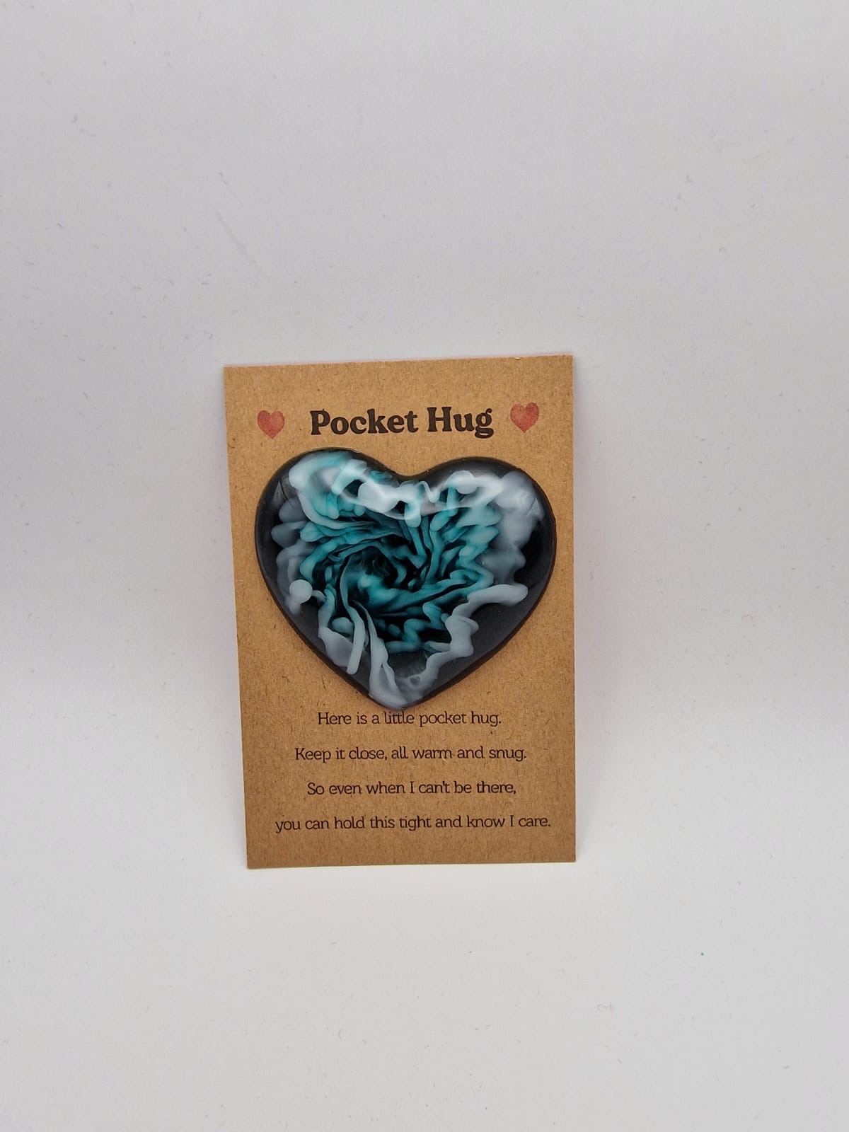 Teal swirl pocket hug