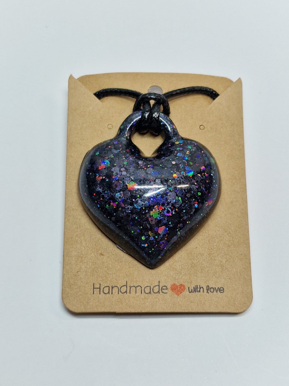 Black sparkly heart pendant