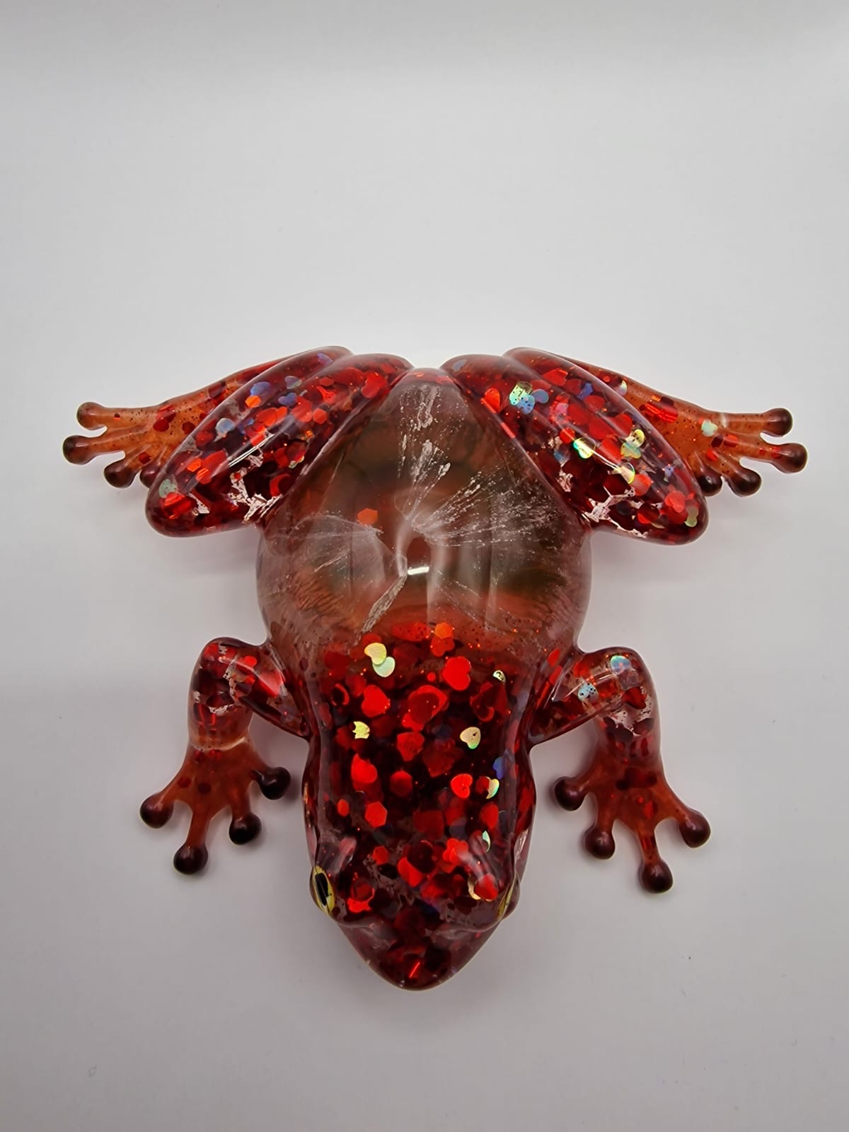 Red sparkly frog back view