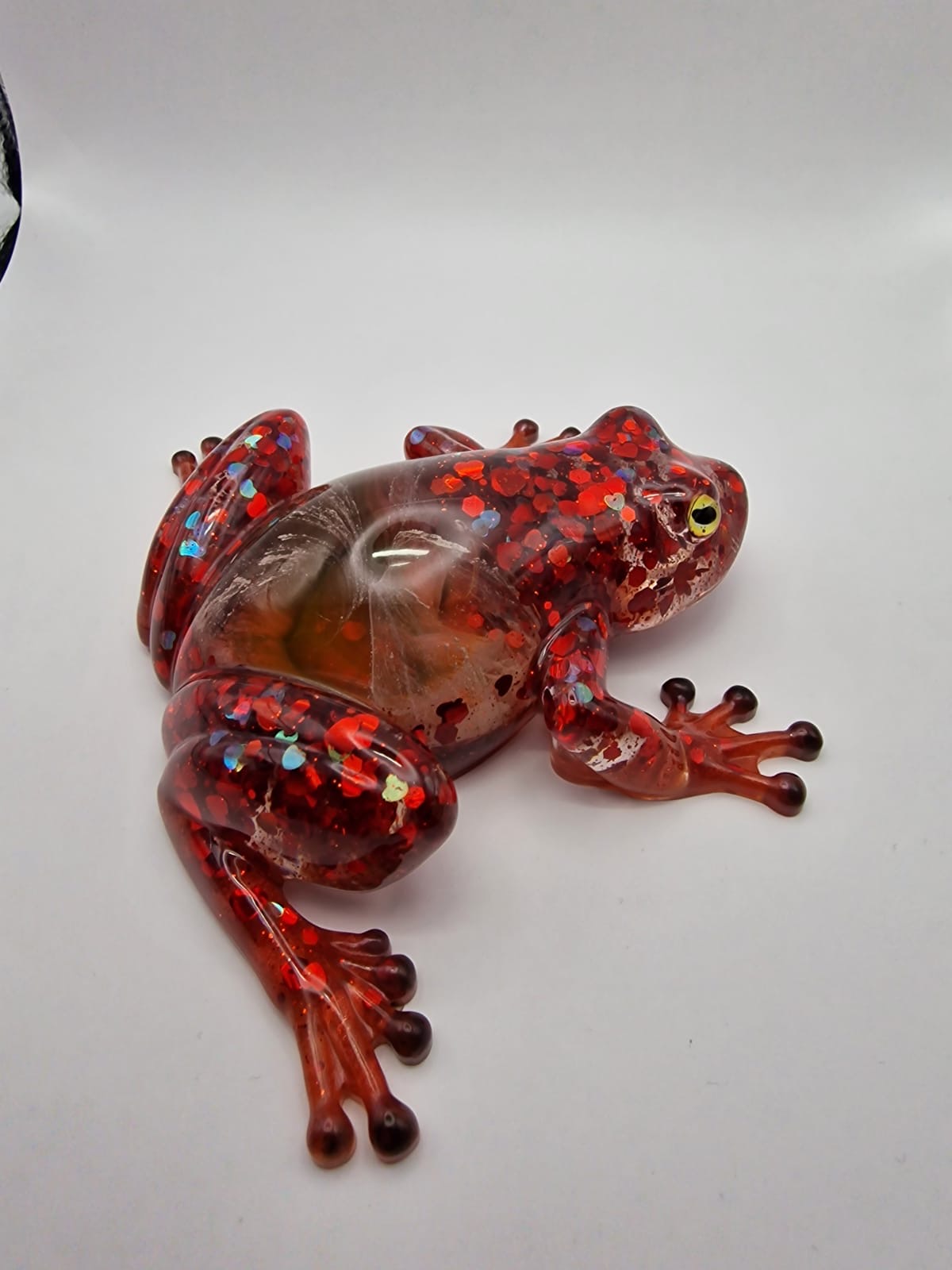 Red sparkly frog side angle