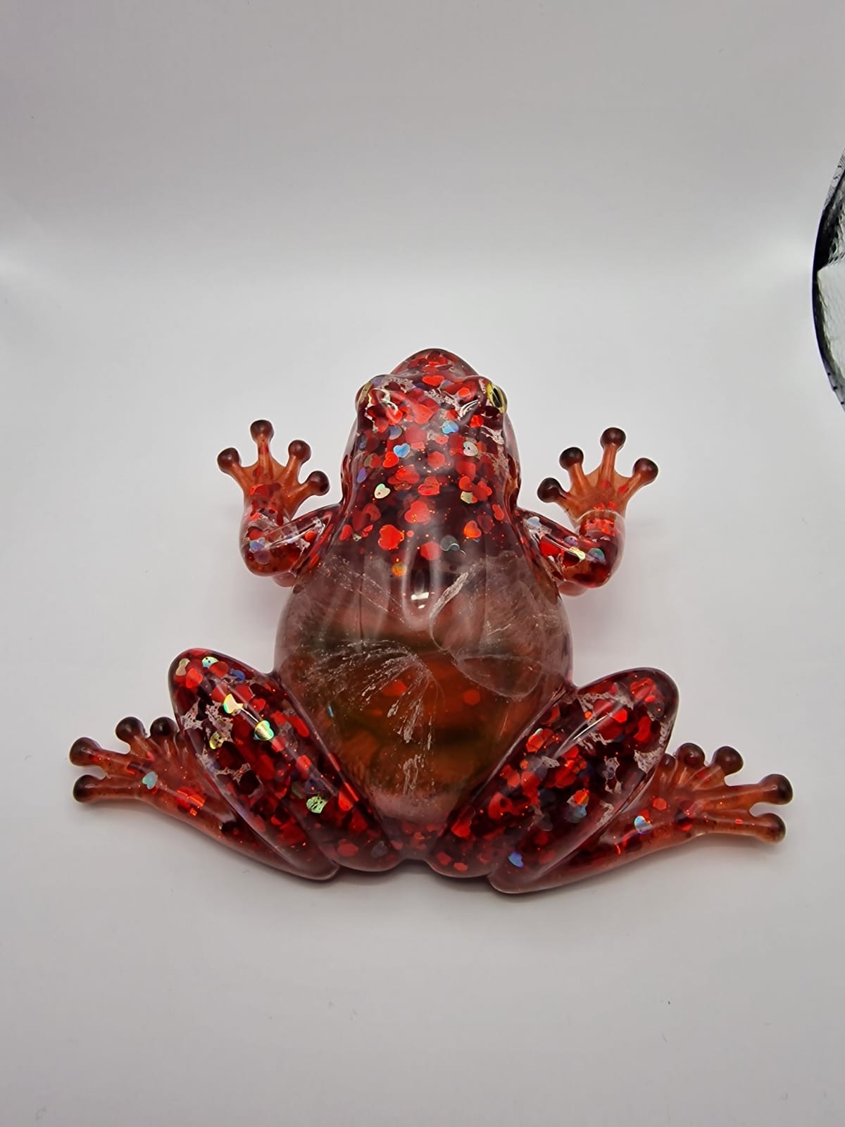 Red sparkly frog front view